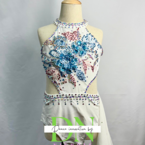 White dance costume with pink & blue appliques and beading.