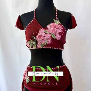 Dark red dance costume with pink floral applique